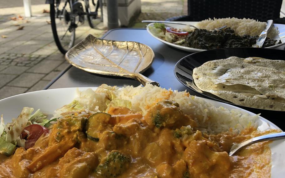 The vegetable korma is a top dish at Raj Mahal in Kaiserslautern, Germany. The restaurant has outdoor seating along the pedestrian zone.