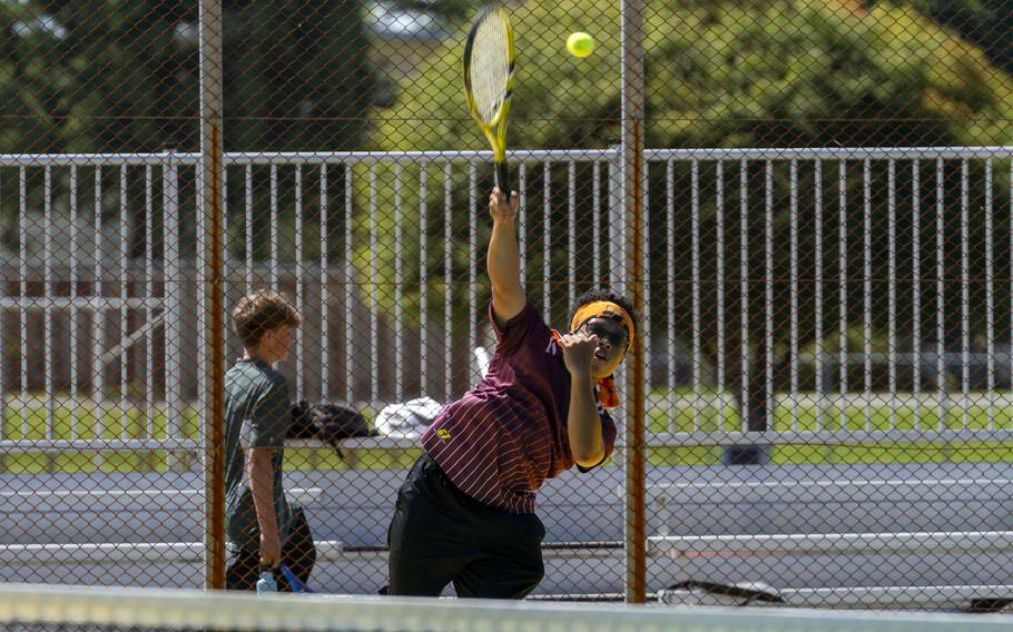 Sean Simpkins serves.