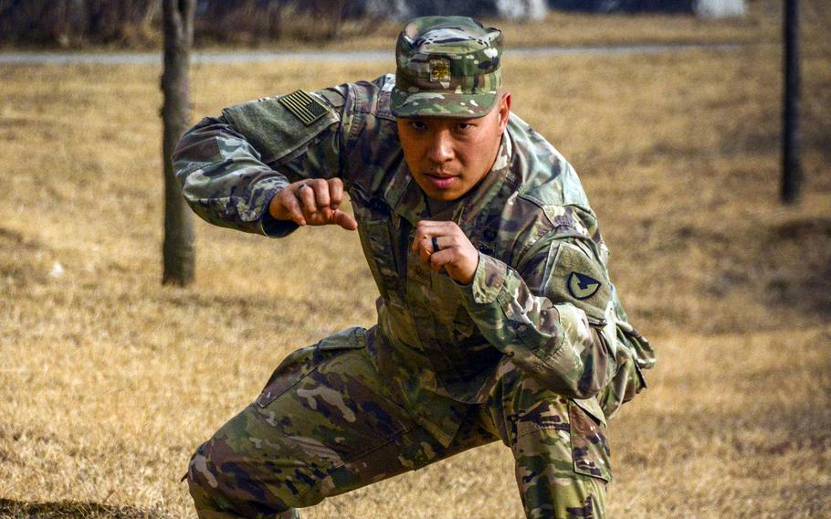 U.S. Army Maj. Gibson Kim, a contestant on the upcoming season of “Physical: 100” on Netflix, poses at Camp Humphreys, South Korea, on March 4, 2024.