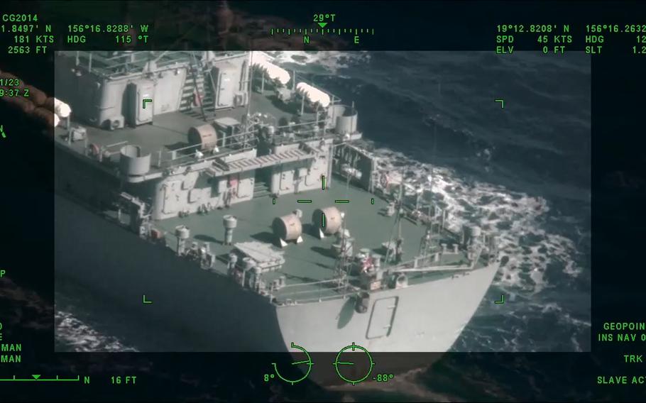 In this screenshot from video, the U.S. Coast Guard monitors a Russian vessel, believed to be an intelligence gathering ship, off the coast of the Hawaiian Islands.