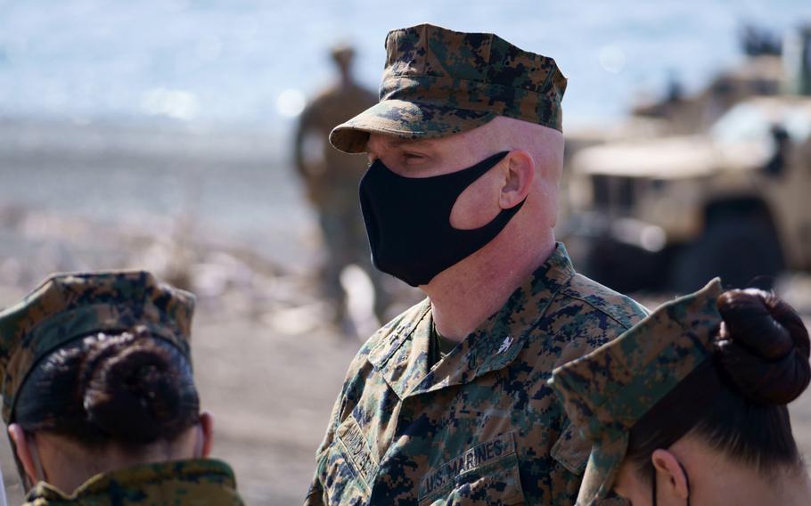 Col. Michael Nakonieczny, commander of the 31st Marine Expeditionary Unit, watches over an amphibious landing at Numazu Beach Training Area, Japan, March 9, 2022.