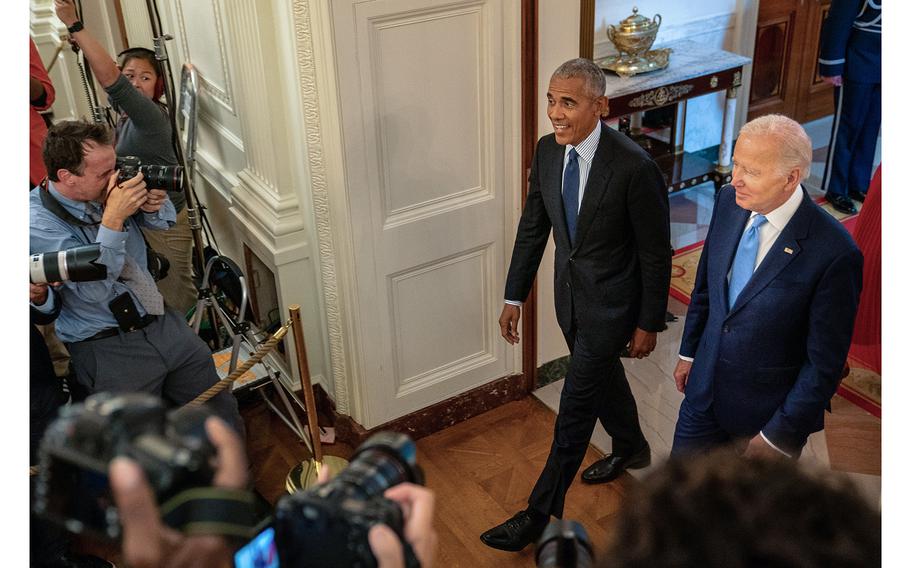 President Joe Biden and former president Barack Obama walk through the White House in September 2022.