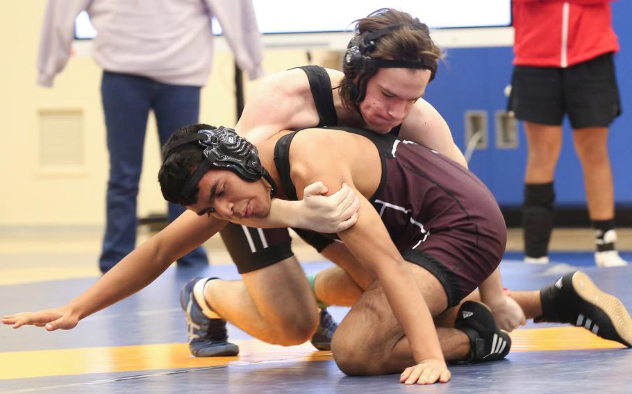 Zama's Kieran Montgomery takes control of teammate Edgar Andalon in the 160-pound final during Saturday's Yokota wrestling tournament.