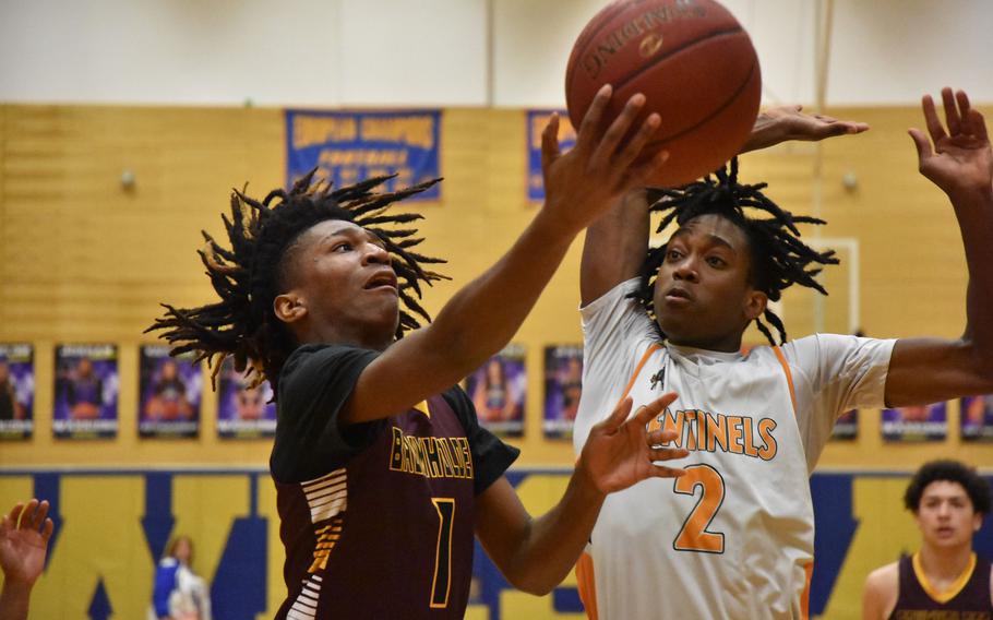 Baumholder’s Kawther Al’Qurashi tries to get the ball past Spangdahlem’s Makario Drummond in a Division III semifinal game Friday, Feb. 16, 2024, at the DODEA European Basketball Championships in Wiesbaden, Germany.