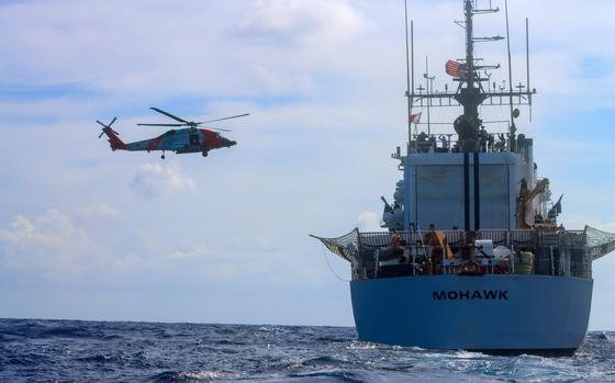 Coast Guard Cutter Mohawk (WMEC 913) and a Coast Guard MH-60 Jayhawk helicopter air crew conduct flight training evolutions in the Caribbean Sea, July 15, 2025. Mohawk’s crew conducted a 75-day maritime border security patrol in the Caribbean Sea, Florida Straits and Caribbean Sea.  (U.S. Coast Guard photo by Seaman Corrie Gill)