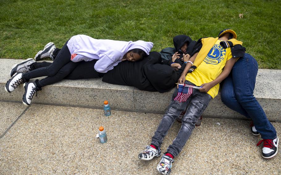 Children use each other to rest against on