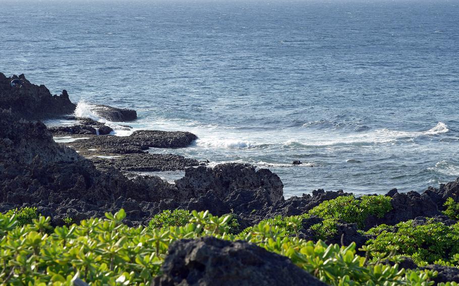 Waves crash along the rocky coast of Cape Zanpa, Okinawa, Oct. 27, 2022.