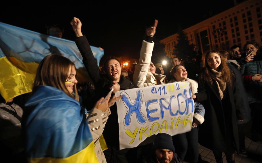 Ukrainians gather in Kyiv’s Independence Square to celebrate Russian troops’ withdrawal from Kherson. 