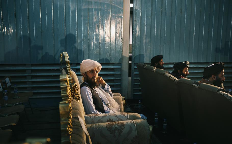 A Taliban official attends a ceremony for the re-opening of the schools at the Amani high school.