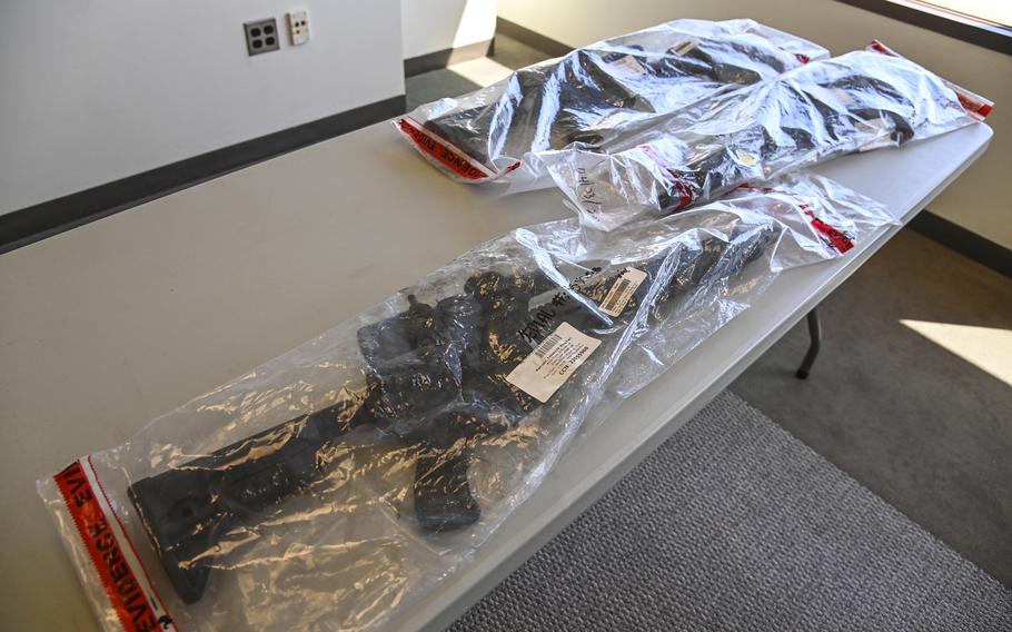Three rifles that police said were used in a sniper attack outside a D.C. school in April 2022.