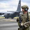 Air Force 2nd Lt. Kenneth Mantle of the Georgia Air National Guard conducts airfield security while a C-130 Hercules is unloaded May 10, 2023, at Joint Base Charleston, S.C., while preparing for the exercise Air Defender 2023, led by the German air force.