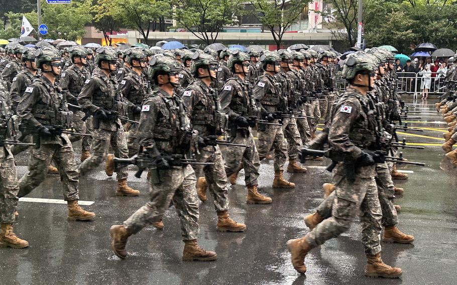 South Korean soldiers march the streets of Seoul during the Armed Forces Day parade, Tuesday, Sept. 26, 2023. 