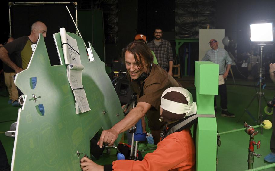 Filmmaker Richard Linklater directs Milo Coy during the live-action shoot for Linklater’s animated film “Apollo 10 1/2: A Space Age Adventure.” 