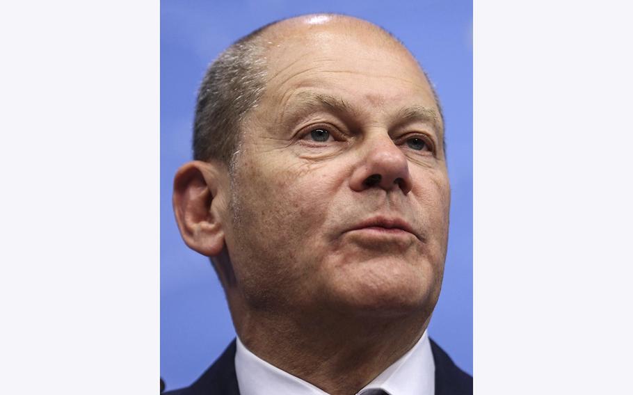 German Chancellor Olaf Scholz attends a briefing at the European Council headquarters in Brussels on May 31, 2022. 