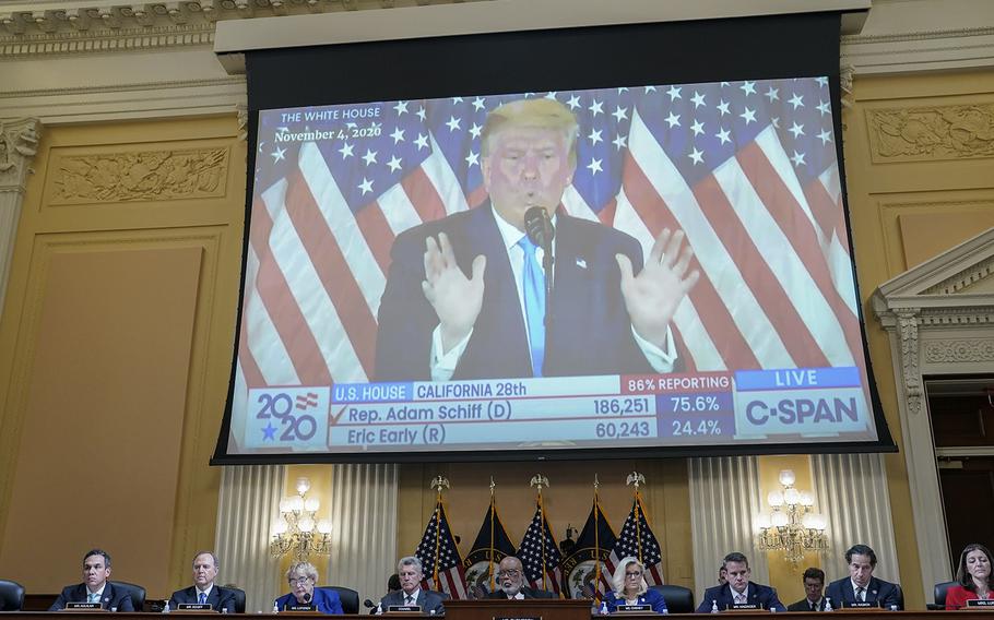 Former president Donald Trump is seen on a screen as the House select committee, investigating the Jan. 6 Capitol riot, holds a hearing on Oct. 13, 2022, in Washington.