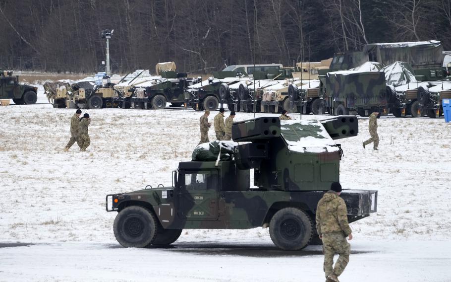 https://www.stripes.com/incoming/222i1s-US-troops-Poland/alternates/LANDSCAPE_910/US%20troops%20Poland