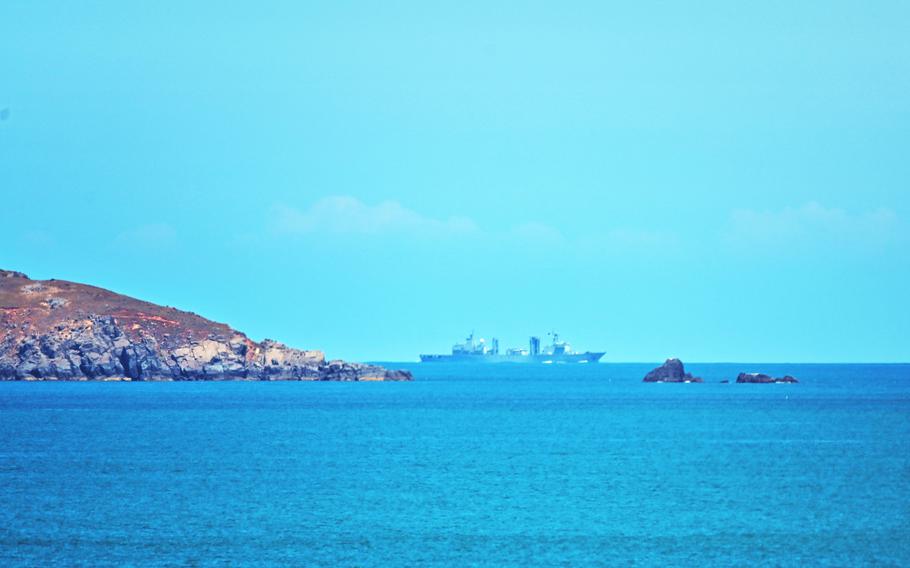 A Chinese military vessel sails off Pingtan island, one of mainland China's closest points to Taiwan, in Fujian province on Aug. 5, 2022. 