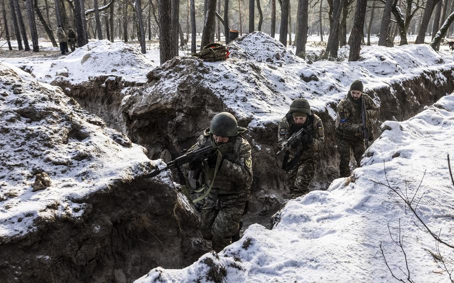 A Ukrainian infantry unit during exercises Tuesday, Feb. 7, 2023, at a camp in the Zaporizhzhia region.