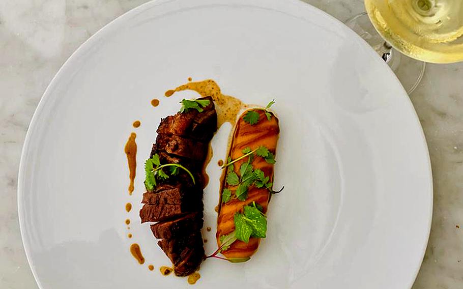 Among the second course offerings at Mood Steakhouse and Garden Bar is roasted duck breast with pumpkin and balsamic caramel. 