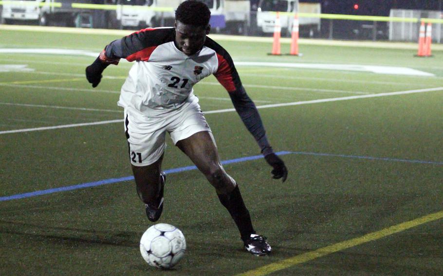 Koboyo Awesso dribbles.