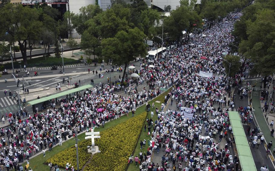 Students and judiciary workers march before Mexico’s Senate