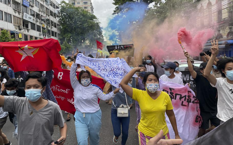 Students protest against the February military takeover by the State Administration Council as they march at Kyauktada township in Yangon, Myanmar on Wednesday July 7, 2021.