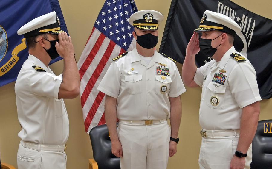 Cmdr. Chris Brown, far right, takes command of Navy Talent Acquisition Group New Orleans on April 15, 2021. 