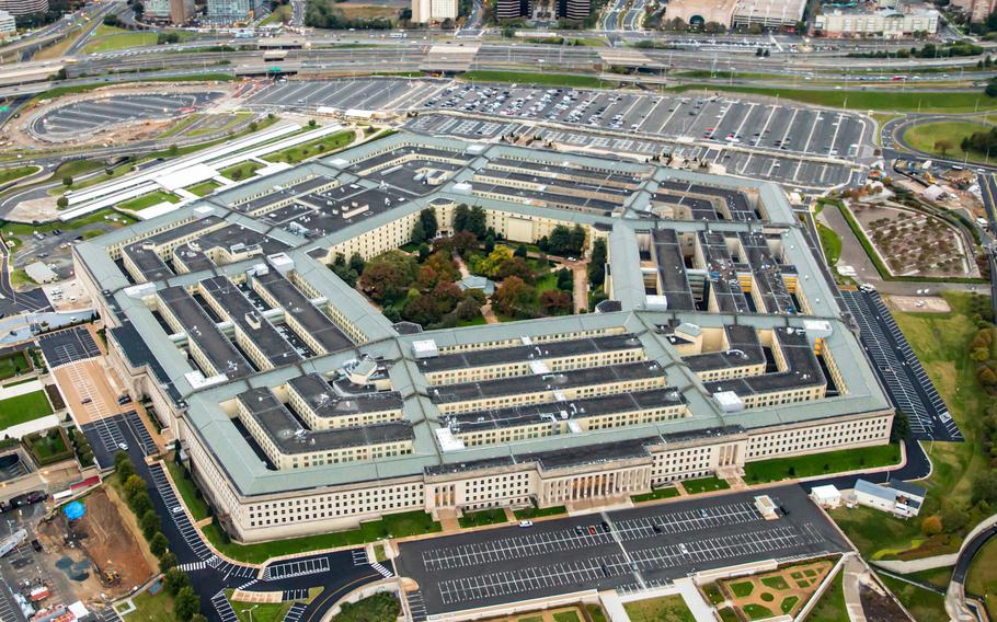 An aerial photo of the Pentagon and Arlington, Va., Oct. 28, 2018. The Pentagon on Wednesday, Sept. 14, 2022, lowered the coronavirus health-risk level at the complex to the lowest severity for the first time since the pandemic began more than two years ago.