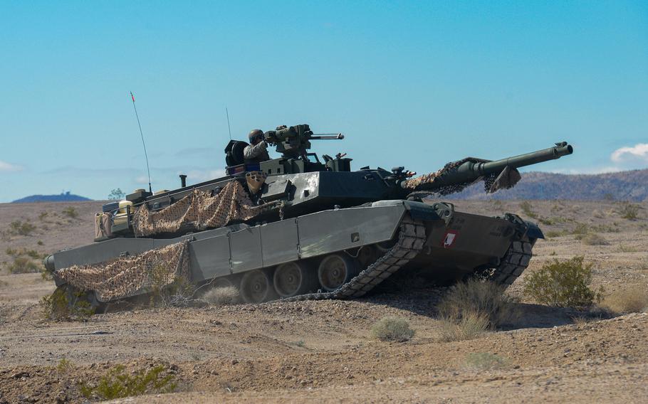 Soldiers with 2nd Battalion, 69th Armor Regiment of the 3rd Infantry Division’s 2nd Armored Brigade Combat Team man their M1A2 SEPv3 Abrams tank, the Army’s most modern main battle tank, Feb. 25, 2023, while training at Fort Irwin, Calif.’s National Training Center.