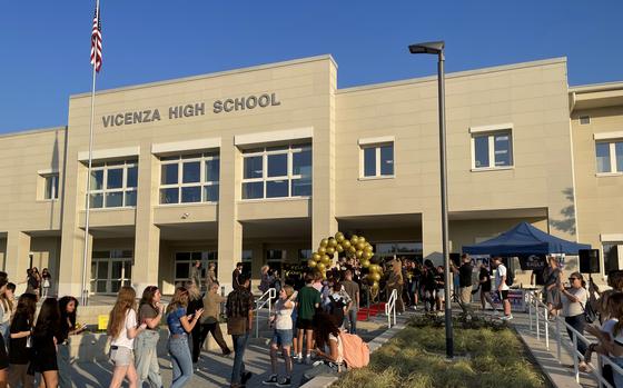 Parents, volunteers and command teams from across Caserma Ederle cheer as they welcome students to the new Vicenza High School at U.S. Army Garrison Italy’s Villagio housing community Aug, 23, 2023.