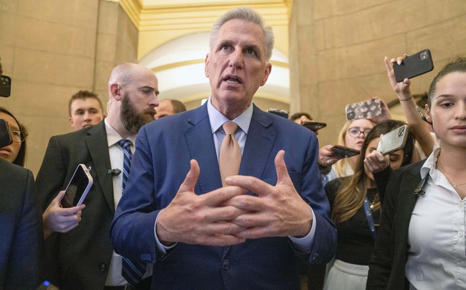 House Speaker Kevin McCarthy of Calif., speaks to reporters, Tuesday, May 23, 2023, as returns to his office from the House floor on Capitol Hill in Washington, as debt limit negotiations continue. 