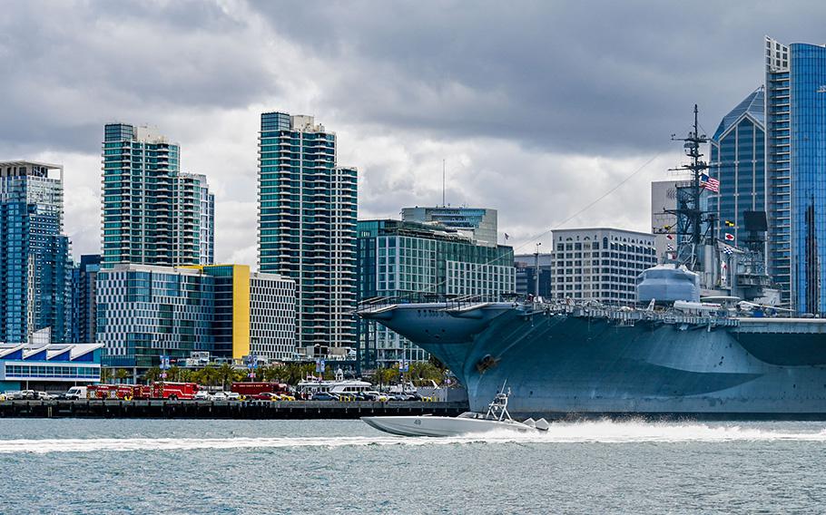 An unmanned T-38 Devil Ray transits San Diego Bay near the USS Midway Museum on May 2, 2023. The Navy announced on Aug. 18, that it will send to sea many warships that are home-ported in San Diego before tropical storm Hilary slams the region.