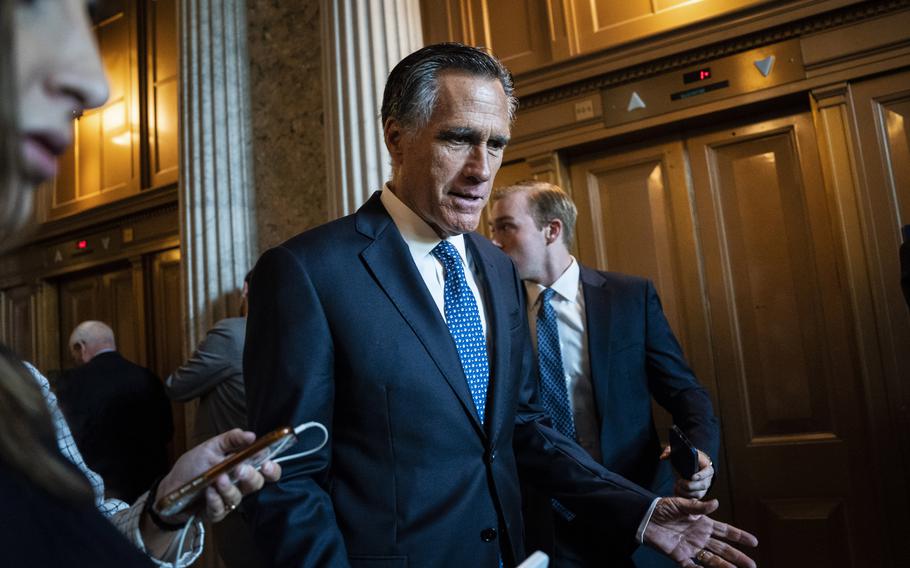Sen. Mitt Romney (R-Utah) walks to a Republican policy luncheon on Capitol Hill on Sept. 12, 2023.