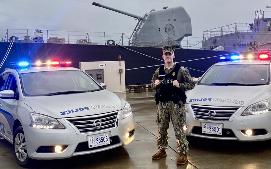 Petty Officer 3rd Class Ryan Tottingham, 23, rescued a pregnant soldier from potentially drowning as her car sank in a flooded underpass at Camp Shields, Okinawa, June 2, 2022. 