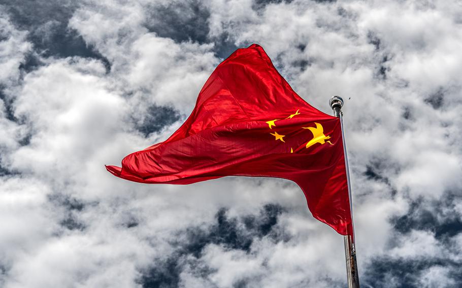 A Chinese flag flies above the Chinese Embassy in Washington, D.C., on July 6, 2022. According to reports on Friday, Oct. 14, a protester hung a banner in Beijing that read “remove dictator and national traitor Xi Jinping,” days before a key political meeting expected to extend Xi’s rule.