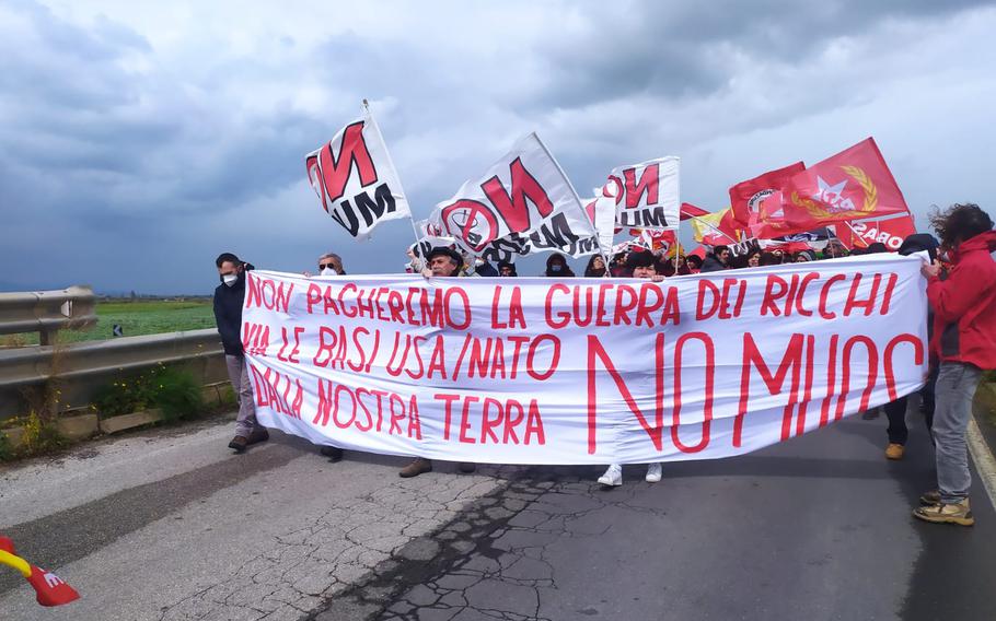 Members of the Italian anti-war group No Muos demonstrate March 20, 2022, outside Naval Air Station Sigonella on the island of Sicily. The group protested the base’s involvement in NATO operations. 