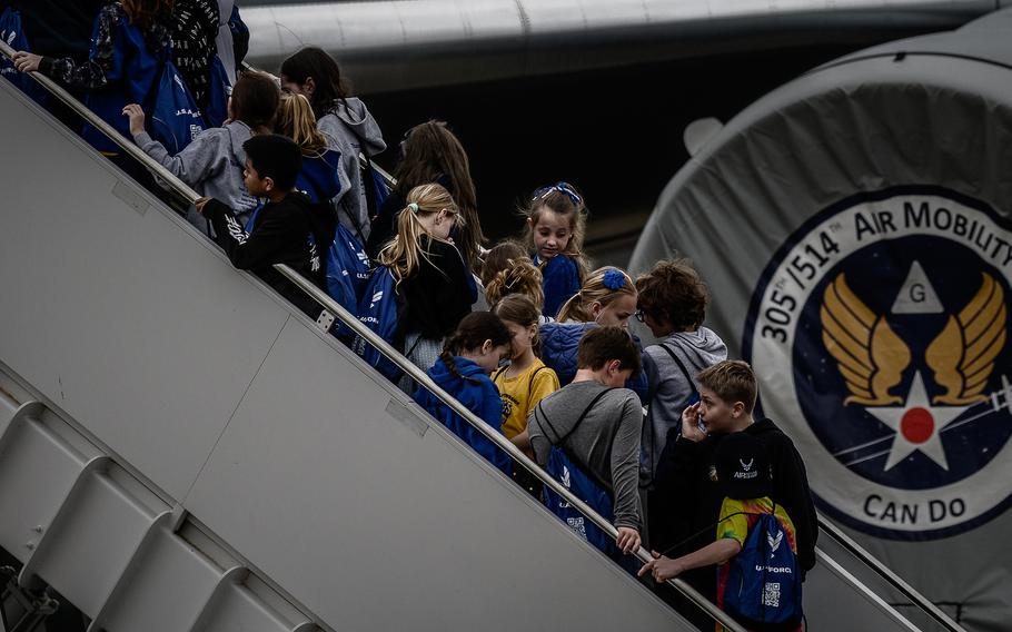 Students wait in line for a tour of the KC-46A Pegasus during a Student Engagement and Career Day event at Joint Base McGuire-Dix-Lakehurst, N.J., Friday, April 19, 2024. 