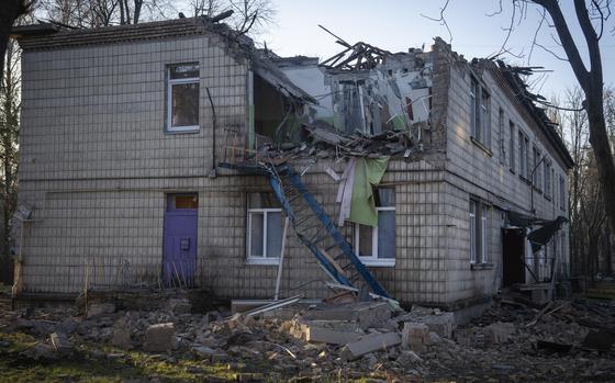 A damaged kindergarten following a Russian drone attack in Kyiv, Ukraine, Saturday, Nov. 25, 2023. Russia launched its most intense drone attack on Ukraine since the beginning of its full-scale invasion on Saturday morning, military officials said. (AP Photo/Efrem Lukatsky)