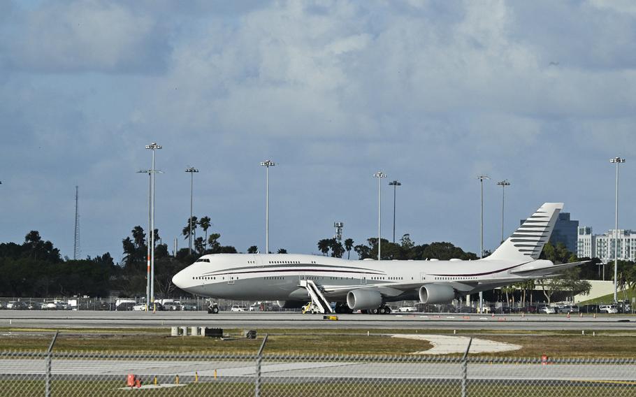 A Boeing 747 sits on the tarmac of Palm Beach International airport.
