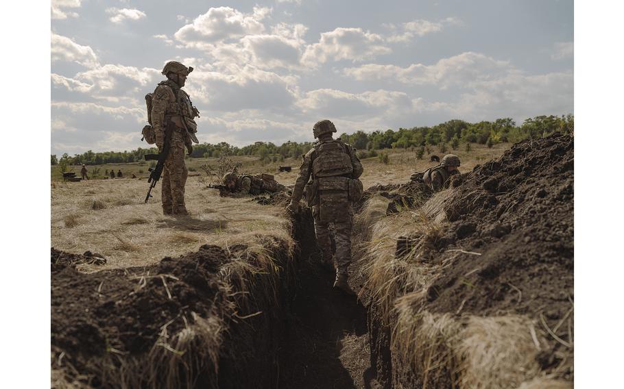 Servicemen of the Lyut brigade train in the Donetsk region.