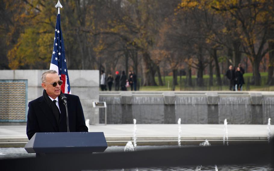 Actor Tom Hanks speaks at the public remembrance for Sen. Bob Dole at the National World War II Memorial on Friday, Dec. 10, 2021. 