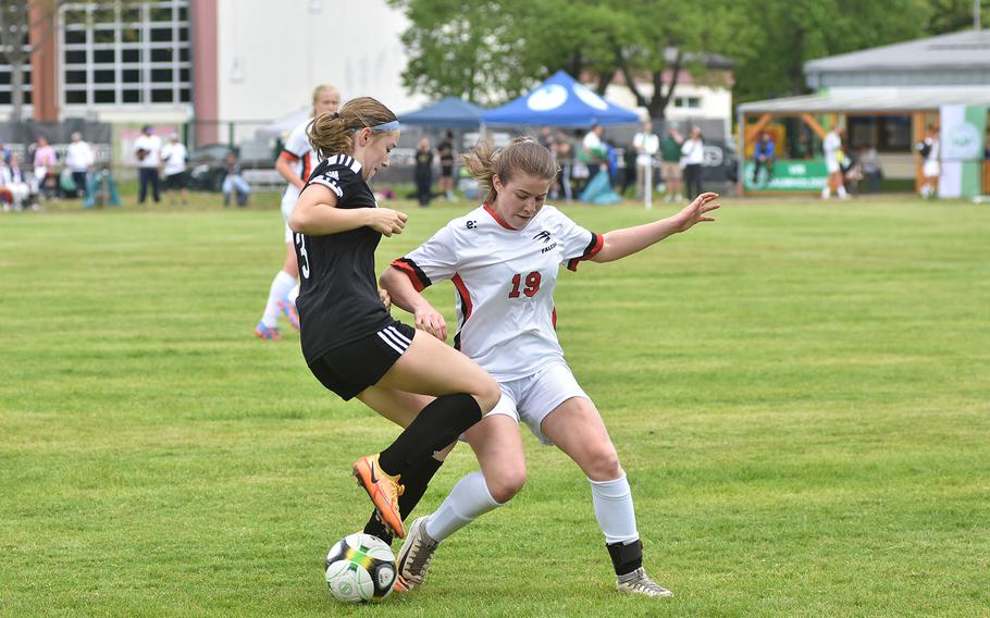 Vicenza's Maya Fitch and American Overseas School of Rome's Silvia Goldman collide while going for the ball on Monday, May 15, 2023, in the first round of the DODEA-Europe Division II soccer championships in Baumholder, Germany.