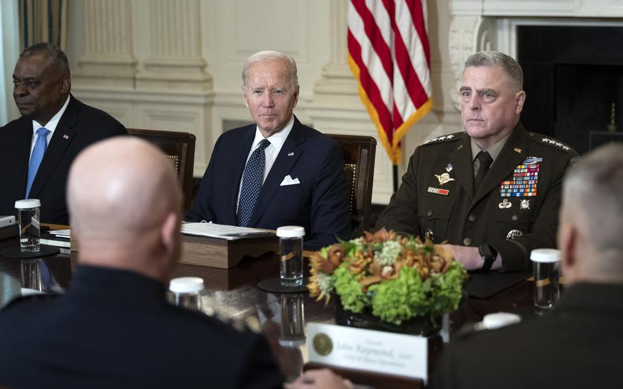 President Joe Biden hosts a meeting with Defense Department leaders, including Joint Chiefs of Staff Chairman Gen. Mark A. Milley, right.