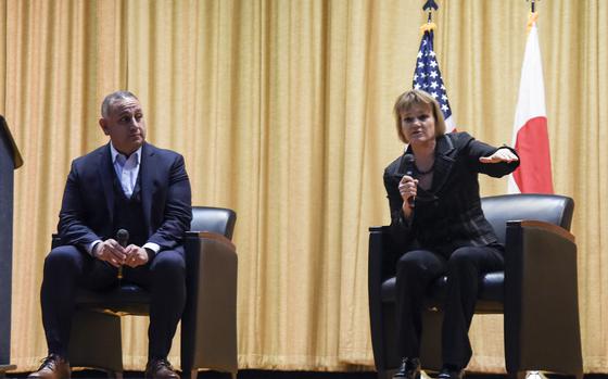 Gilbert Cisneros Jr., undersecretary of defense for personnel and readiness, and Seileen Mullen, acting assistant secretary of defense for health affairs, answer questions about civilians' access to medical care during a town hall at Yokota Air Base, Japan, Monday, Jan. 30, 2023. 