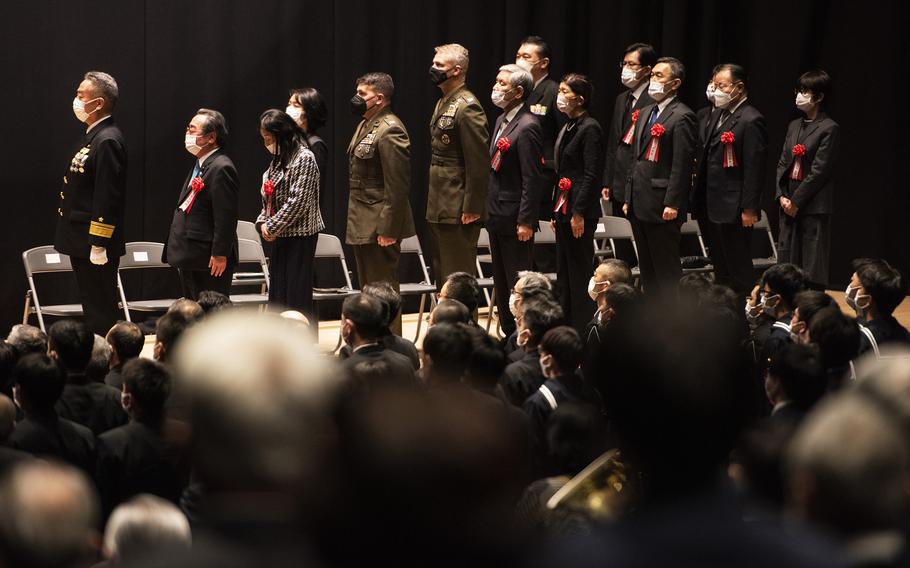 Members of the Japan Maritime Self-Defense Force, and others, celebrate Fleet Air Wing 31's 50th anniversary at Marine Corps Air Station Iwakuni, Japan, March 4, 2023.
