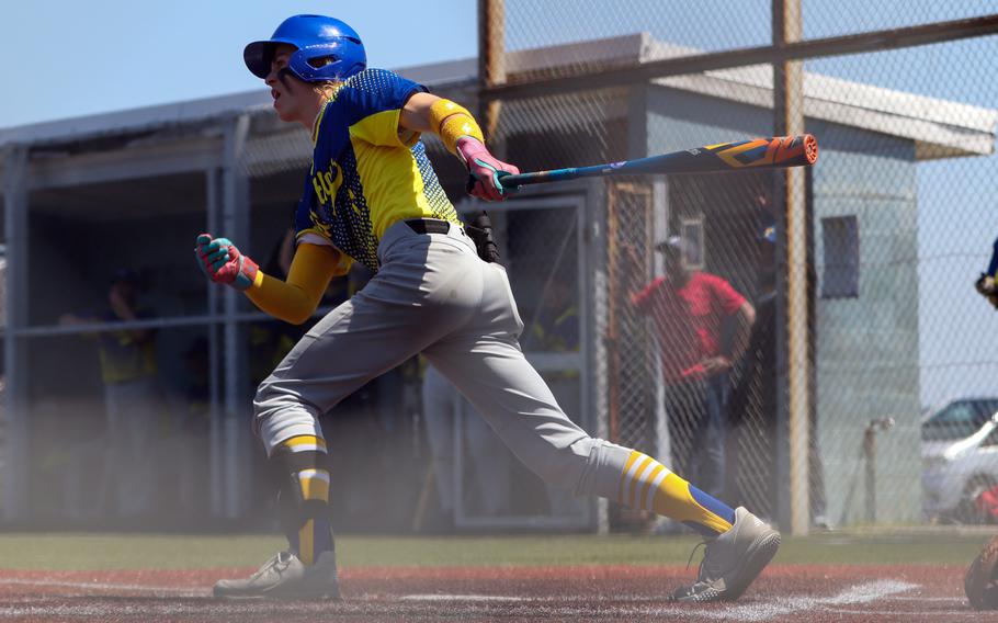 Josh Low takes a swing.