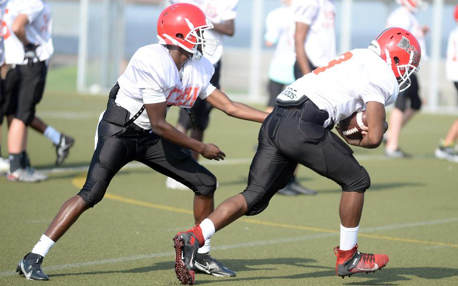 Senior Josiah Chambers is one of three Nile C. Kinnick quarterback candidates; junior Wendell Harrison returns at running back.