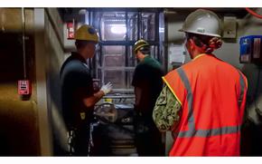 Personnel in support of Joint Task Force-Red Hill conduct an annual elevator inspection inside Red Hill Bulk Fuel Storage Facility Halawa, Hawaii, on Nov. 27, 2023.