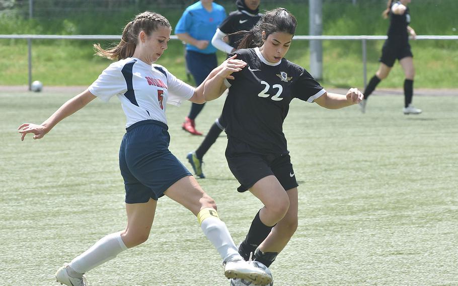 Aviano's Makinley Carroll and Bahrain's Mariam Kharat battle for the ball on Tuesday, May 17, 2022, at the DODEA-Europe girls Division II soccer championships at Landstuhl, Germany.