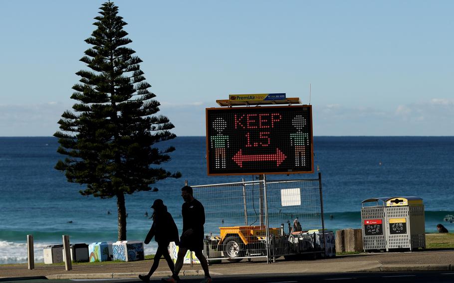 A COVID-19 public health order sign for social distancing on Bondi Beach in Sydney on July 4, 2021.